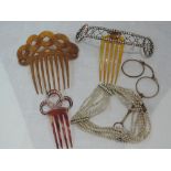 A selection of vintage jewellery including hair combs, a lorgnette and an eight strand seed pearl