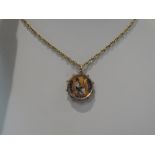 A Victorian 1847 enamelled four pence coin in a glass pendant with decorative 9ct gold mount on a