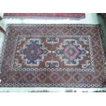 A 20th century rug of Turkmen style having brown ground, 150 x 100cm