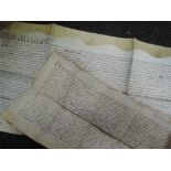 A 16th century vellum indenture manuscript document dated 1598 and another dated 1717