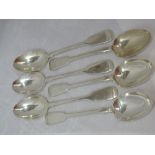 Six Victorian silver table spoons of plain fiddle back form, London 1882, makers mark worn, approx