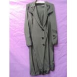 A 1930s ladies coat in a black grosgrain type fabric, having contrasting panel details to sleeves