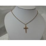 A 9ct gold cross having engraved decoration on a 9ct gold belcher chain, approx 18'