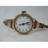 A lady's vintage 9ct gold wrist watch having an Arabic numeral dial with subsidiary seconds on a