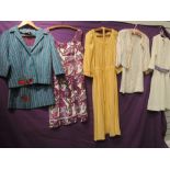 A small lot of vintage items, includes a suit,a dress and jacket and three dresses. approx late