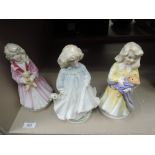 Three Royal Doulton figures modelled as Faith, Hope and Charity, Limited Edition HN3082, 3061 and