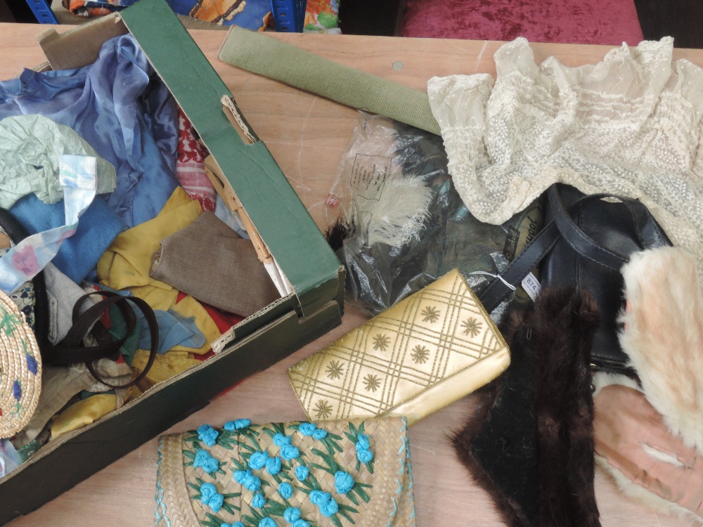A really varied lot of vintage and antique containing some early clothing, stage clothing,dolls