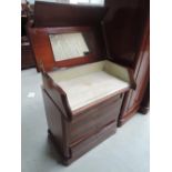 A mid 19th century mahogany Continental wash stand having cantilever lift top, concealing fitted
