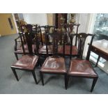 A set of six (4+2) Edwardian mahogany dining chair having slat backs and leather inset seats on