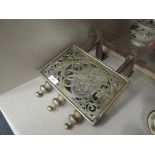 A 19th century brass trivet/kettle stand of adjustable design