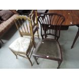 A late Victorian/Edwardian mahogany occasional chair having wave backs with upholstered seat and