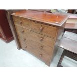 A Victorian mahogany chest of two short and three long drawers on bracket feet