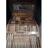 A large wooden canteen containing a 6 place silver plated cutlery set in the Kings pattern, with