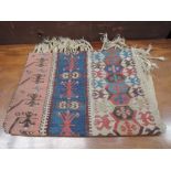 A 19th century rug of Turkmen style having multi coloured ground