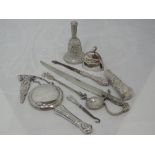 A selection of HM silver and white metal including bells, powder compact, souvenir spoon etc