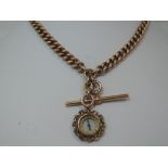 A 9ct gold curb link watch chain with T bar and compass fob, approx 67g