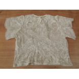 Pretty lace blouse, around 1930s having fluted sleeves and beautiful details throughout. Small