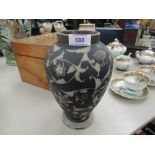 A Martin Bros stoneware vase having incised foliate decoration, signed, and dated 1885