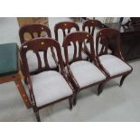 A set of six Victorian mahogany refurbished salon dining chairs having scoop back and later