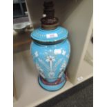 A Victorian painted blue glass lidded vase, converted to table lamp