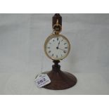 A yellow metal top wound pocket watch having a Roman numeral dial to white enamel face in an