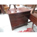 A late Victorian mahogany chest of two short and three long cockbeaded drawers on bracket feet in