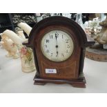 An Edwardian mahogany mantel clock having line inlay decoration