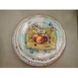 A Royal Worcester dish having fruit decoration by Shuck, and three 19th century plates including