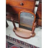 A Victorian mahogany toilet/swing mirror having twist supports