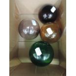 Four various fisherman's floats/witches balls