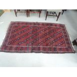 A 20th century rug in the Eastern style having red ground, 45in x 73in