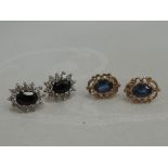 A pair of sapphire and cubic zirconia cluster stud earrings in white metal stamped 9K and and