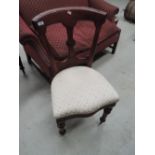 A selection of eight late Victorian mahogany dining chairs having later cream upholstered seats