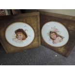 A pair of Victorian porcelain plaques having painted pictorial decoration of young ladies