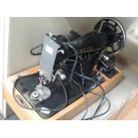 A vintage electric Singer Sewing machine, BZK5-12