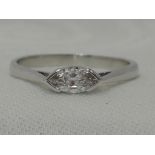 A lady's marquise cut diamond solitaire dress ring, approx 0.40ct in a collared mount on an 18ct