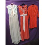 Three vintage dresses, one 1960s muslin layered maxi dress with ruffled neckline and a label reading