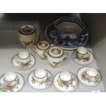 A Satsuma pottery tea service having floral Chrysanthemum decoration and a selection of Ringtons