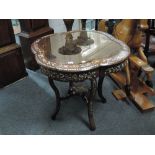 An early 20th century Chinese rosewood occasional table having mother of pearl floral inlay