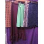 A lot of five vintage 1960s and 70s skirts, one in Welsh wool the others a mixture of styles and