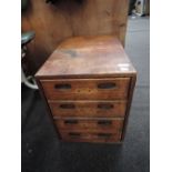 A set of four collector/stationary drawers
