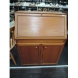 A teak style bureau