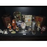 A selection of figures and tins including sugar and Geobels