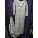 1960s wedding dress having lace detailing, long sleeves and train. Good condition, lovely quality,