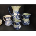 A selection of blue and white wear jugs