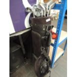 A set of golf clubs and carry case
