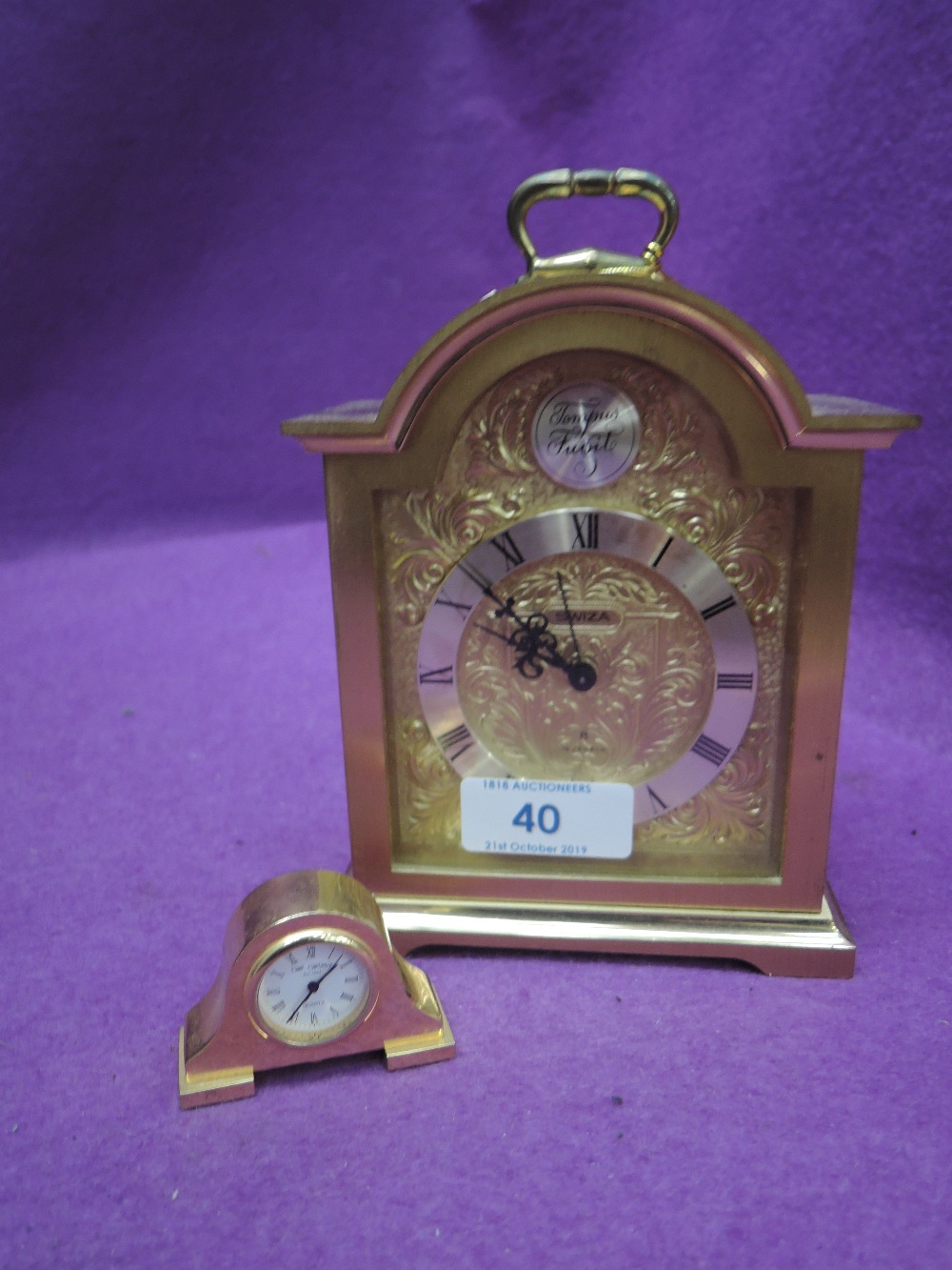 A carriage clock by Swiza and similar W Widdop