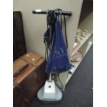 An Electrolux floor polisher