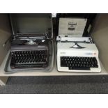 An Olympia typewriter in brown in a hard case