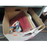A box of various vinyl albums stage musical mainly